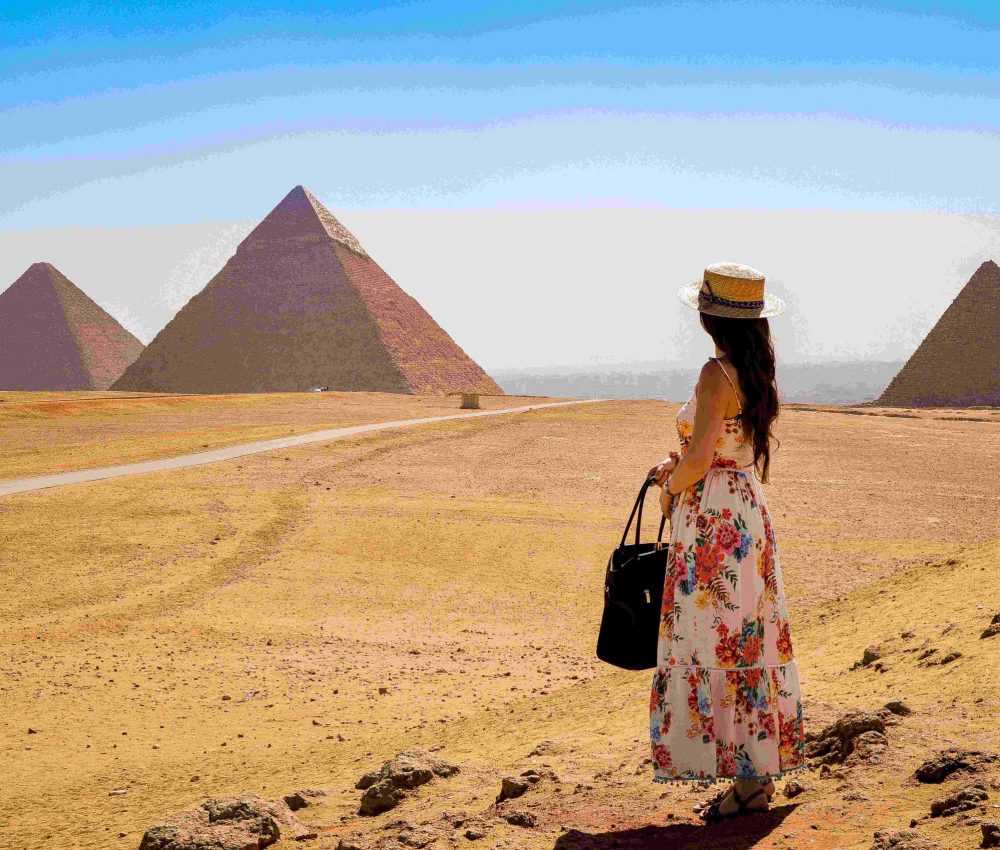 young-woman-visiting-pyramids-egypt