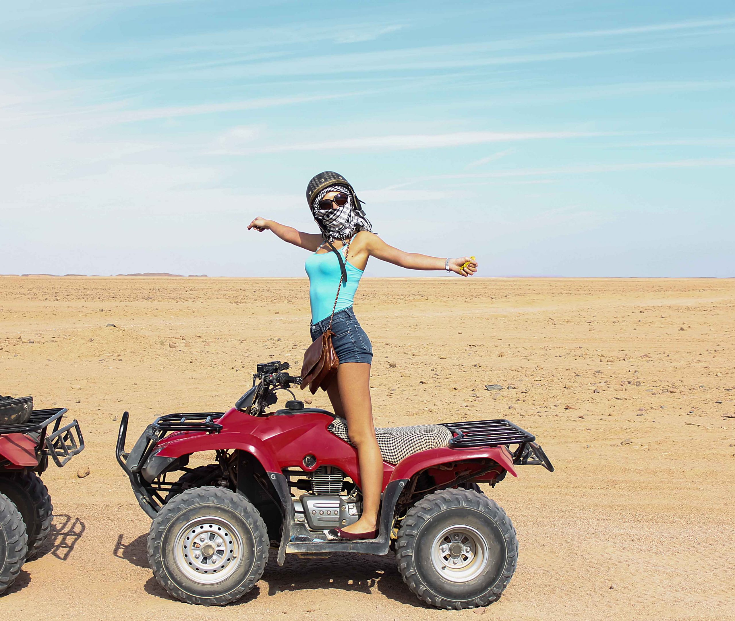 elegant-woman-riding-quadrocycle-atv